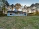 Charming single-story home with a welcoming front porch and mature trees at 117 Old Stagecoach Rd, Carrollton, GA 30116