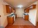 Functional kitchen with tile floors, countertops, and gas range at 117 Old Stagecoach Rd, Carrollton, GA 30116