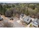 An aerial view showcases the layout of the home in a neighborhood near green spaces at 4654 Liberty Square Dr, Acworth, GA 30101