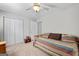 Cozy bedroom with a trundle bed, double closet, and neutral carpeting at 4654 Liberty Square Dr, Acworth, GA 30101