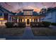 Charming two-story home with inviting front porch and manicured landscaping, perfect for curb appeal at 4654 Liberty Square Dr, Acworth, GA 30101