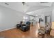 Open floor plan with vaulted ceiling, hardwood floors, and light grey walls at 4654 Liberty Square Dr, Acworth, GA 30101