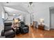 Open-concept living space with vaulted ceilings, hardwood floors, and neutral paint at 4654 Liberty Square Dr, Acworth, GA 30101