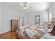 Comfortable main bedroom with hardwood floors, dresser, and calming neutral color palette at 4654 Liberty Square Dr, Acworth, GA 30101