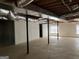 Large unfinished basement with support columns and ample space ready to be finished at 9039 River Bend Ct, Villa Rica, GA 30180