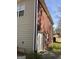 Shot of home exterior showing brick wall, siding and access door at 9039 River Bend Ct, Villa Rica, GA 30180