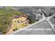 Aerial view showing estimated property lines of a wooded homesite with proximity to the main road at 275 S Bethany Rd, Mcdonough, GA 30252