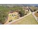 Aerial view of a residential home on a large lot surrounded by lush greenery and mature trees at 275 S Bethany Rd, Mcdonough, GA 30252