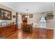 Bright dining room featuring hardwood floors, a dining table and ample storage at 275 S Bethany Rd, Mcdonough, GA 30252