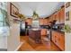 Functional kitchen with dark countertops and a brick kitchen island at 275 S Bethany Rd, Mcdonough, GA 30252