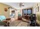 Comfortable living room with hardwood floors, ceiling fan and access to a bedroom at 275 S Bethany Rd, Mcdonough, GA 30252