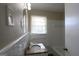 Bathroom featuring granite countertop and a shower-tub combo at 1751 Woodsloe Dr, Decatur, GA 30035