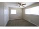Comfortable bedroom featuring carpet, a ceiling fan, and natural light at 1751 Woodsloe Dr, Decatur, GA 30035