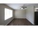 Bright living room with wood flooring and a modern ceiling fan at 1751 Woodsloe Dr, Decatur, GA 30035