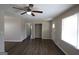 Spacious living room featuring wood floors, neutral paint, and a ceiling fan at 1751 Woodsloe Dr, Decatur, GA 30035