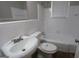 Functional bathroom featuring a clean vanity, toilet, and a shower-tub combination at 2096 Dellwood Pl, Decatur, GA 30032