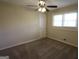 Bedroom with carpet, ceiling fan, and window at 2823 Horse Shoe Dr, Atlanta, GA 30316