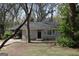 Charming single-story home with a well-manicured front yard, offering a welcoming curb appeal at 2823 Horse Shoe Dr, Atlanta, GA 30316