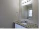 Bathroom featuring granite countertop, updated fixtures, and neutral paint at 3065 Glendale Ct, Decatur, GA 30032