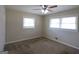 Spacious bedroom with a ceiling fan, hardwood floors, and ample natural light at 3065 Glendale Ct, Decatur, GA 30032