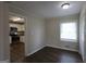 Cozy dining area with views into the updated kitchen and hardwood floors at 3065 Glendale Ct, Decatur, GA 30032