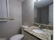 Bathroom featuring a granite vanity and a toilet at 4044 Lindsey Dr, Decatur, GA 30035