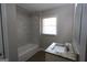 Bathroom with a granite vanity and a shower and bath combination at 4044 Lindsey Dr, Decatur, GA 30035