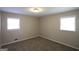 Bedroom featuring carpet, windows, and neutral walls, offering a blank canvas at 4044 Lindsey Dr, Decatur, GA 30035