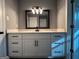 Bathroom vanity featuring clean lines, ample storage, and modern lighting at 1351 John Robert Dr, Morrow, GA 30260