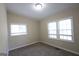 Serene bedroom with carpet floors, a large window, and ample natural light at 3037 San Juan Dr, Decatur, GA 30032