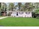 Charming single-story home boasts a well-manicured lawn and inviting carport at 3037 San Juan Dr, Decatur, GA 30032