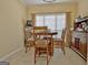 Cozy dining area with a wooden table and natural light at 170 Habersham Dr, Fayetteville, GA 30214