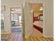 Hallway view showcasing an open doorway to the screen porch and main bedroom at 170 Habersham Dr, Fayetteville, GA 30214