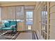 Cozy screened porch with comfortable seating and natural light, offering a relaxing outdoor space at 170 Habersham Dr, Fayetteville, GA 30214