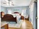 Large main bedroom features a ceiling fan and wood floors at 315 Antebellum Way, Fayetteville, GA 30215