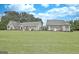 Expansive backyard with a well-manicured lawn, perfect for outdoor activities at 676 Mcbride Rd, Fayetteville, GA 30215