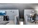 Spacious bonus room with stairs leading down and decor at 676 Mcbride Rd, Fayetteville, GA 30215