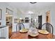 Cozy dining area with views into the kitchen and living spaces, perfect for entertaining at 676 Mcbride Rd, Fayetteville, GA 30215