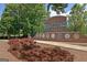 The Fayetteville sign features beautiful brickwork and lovely landscaping at 676 Mcbride Rd, Fayetteville, GA 30215