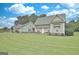 Charming home with a manicured lawn and inviting curb appeal at 676 Mcbride Rd, Fayetteville, GA 30215