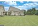 Exterior view showcasing the home's architecture and well-maintained landscaping at 676 Mcbride Rd, Fayetteville, GA 30215