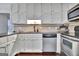Modern kitchen with stainless steel appliances and ample cabinet space at 676 Mcbride Rd, Fayetteville, GA 30215