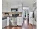 Spacious kitchen with stainless steel appliances and an adjoining dining area at 676 Mcbride Rd, Fayetteville, GA 30215