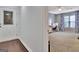 Versatile room features neutral carpet and paint with modern door and a work area by the window at 676 Mcbride Rd, Fayetteville, GA 30215