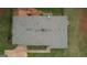 An aerial view of the house showing the roof, gutters and surrounding lawn at 1910 Reese Rd, Rutledge, GA 30663