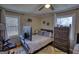 Inviting bedroom with a cozy bed, lots of natural light, and ample space at 1910 Reese Rd, Rutledge, GA 30663