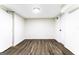 Open basement space with vinyl flooring, recessed lighting, and accessible doorways at 2145 Venesa Cir, Austell, GA 30168