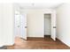 Bright bedroom with hardwood floors and open closet at 2145 Venesa Cir, Austell, GA 30168