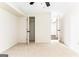 Carpeted bedroom with open closet and doorway, providing ample storage and access at 2145 Venesa Cir, Austell, GA 30168