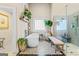 Stylish bathroom with a standalone tub, a walk-in shower, decorative tile flooring, and natural light from a window at 2173 Conyers Se St, Covington, GA 30014
